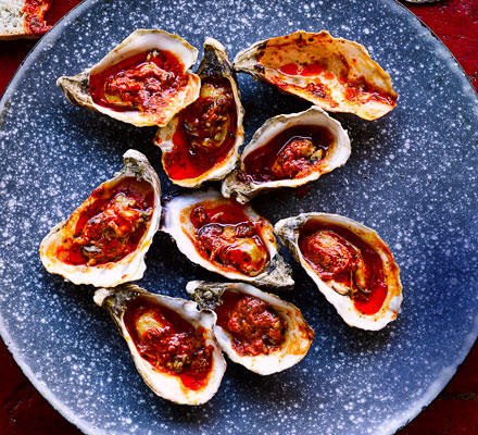 Barbecued oysters with garlic, paprika & Parmesan butter