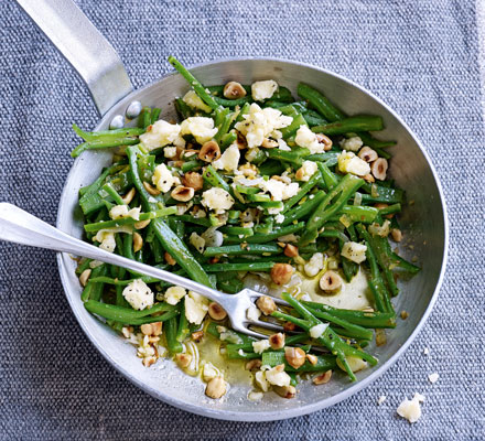 Quick-fried runner beans with cheddar & hazelnuts