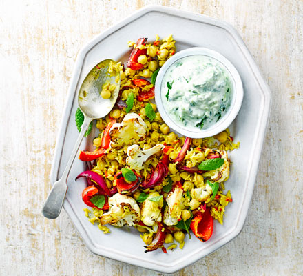 Spicy cauliflower rice with minty cucumber raita