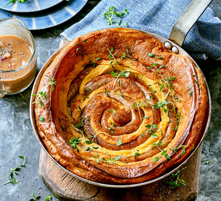 Catherine wheel toad-in-the-hole with honey & mustard onions
