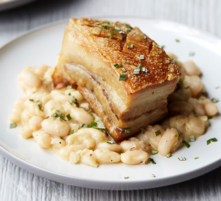 Confit pork belly with cannellini beans & rosemary
