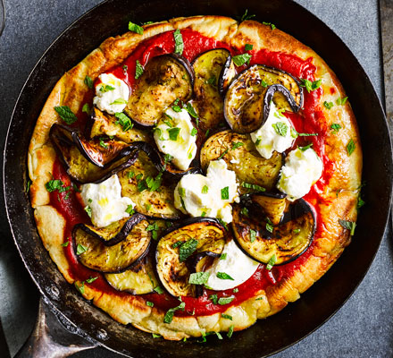 Frying pan pizza with aubergine, ricotta & mint