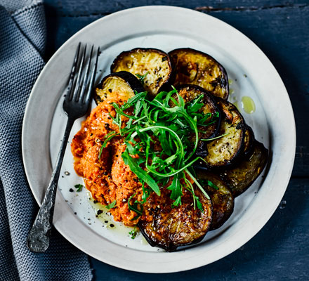 Garlicky aubergine steaks with romesco sauce