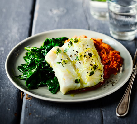 Herb & garlic baked cod with romesco sauce & spinach