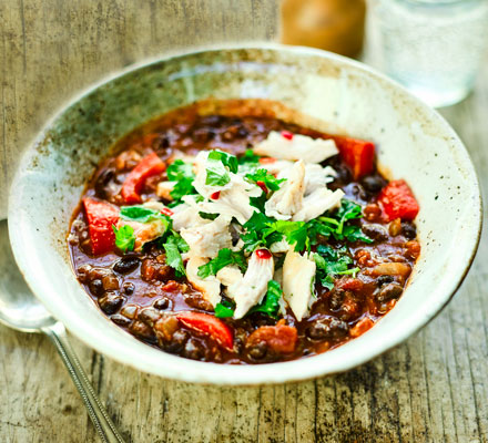 Mexican bean soup with shredded chicken & lime