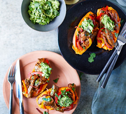 Baked sweet potatoes with steak fajita filling