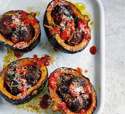 Meatball-stuffed squash with spinach sauce