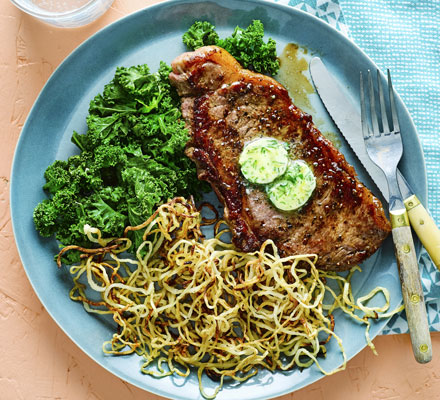 Steak with rosemary celeriac fries, kale & garlic butter