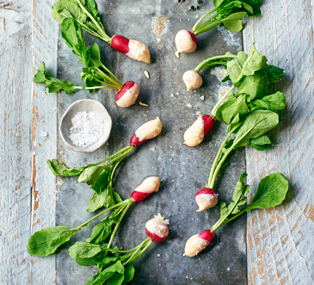 Radishes dipped in brown butter
