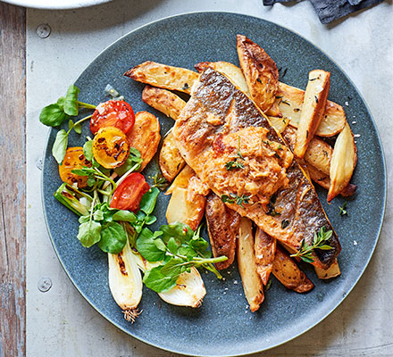 Grilled sea bass, crisp potato skins & crab butter