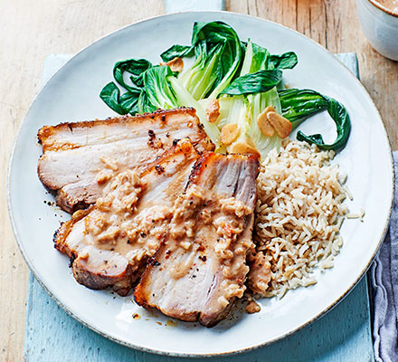 Roast pork belly with caramelised peanut sauce