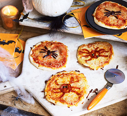 Halloween spider pizzas