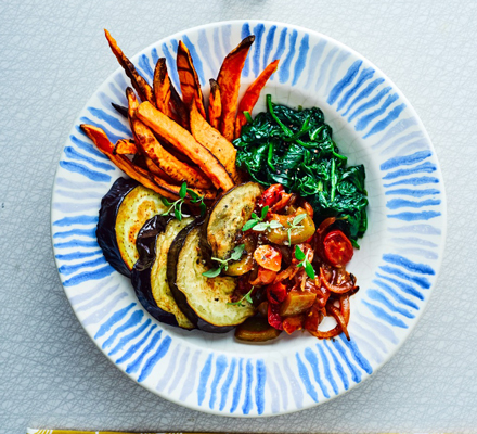 Roast aubergine with goulash sauce & sweet potato fries