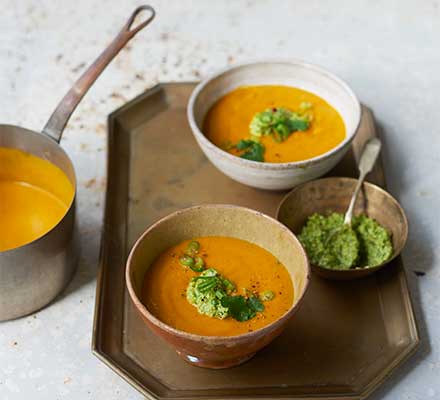 Curried carrot soup with cashew & coriander salsa