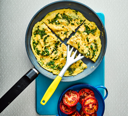 Herb omelette with fried tomatoes