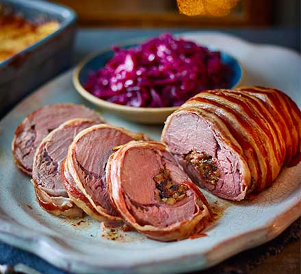 Stuffed saddle of venison with prunes & brioche