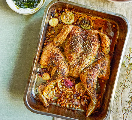 Herby spatchcocked chicken with crisp chickpeas & wild garlic labneh