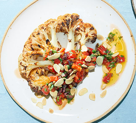 Cauliflower steaks with roasted red pepper & olive salsa