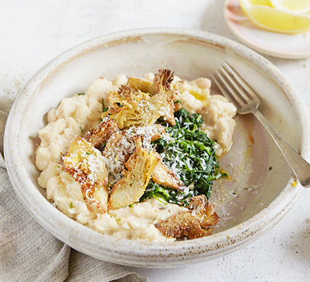 Mashed cannellini beans with wilted greens & fried artichokes