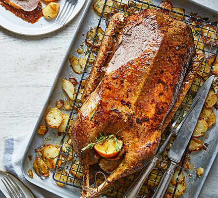 Honey-glazed spiced roast goose & confit potatoes