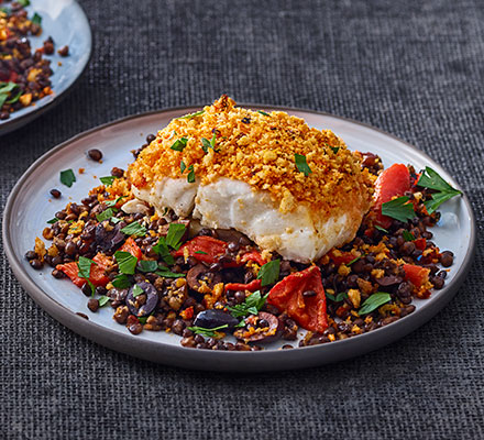 Harissa-crumbed fish with lentils & peppers