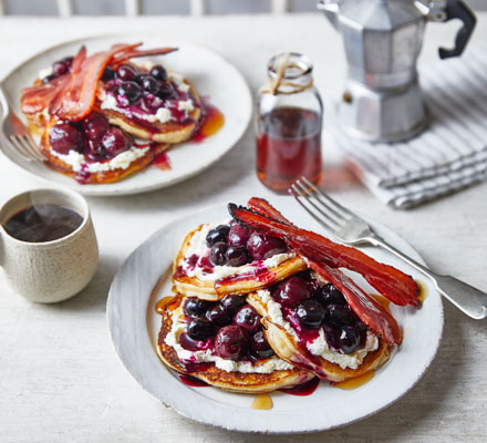 Fluffy American pancakes with cherry-berry syrup