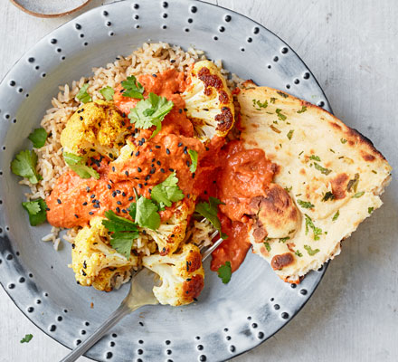 Roasted cauliflower with tomato & cashew sauce