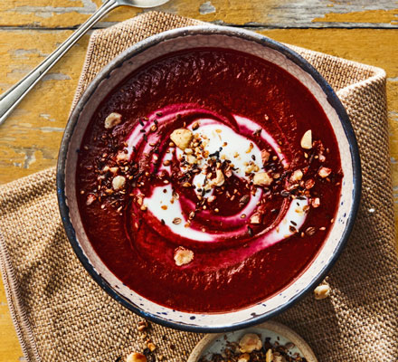 Beetroot, cumin & coriander soup with yogurt and hazelnut dukkah