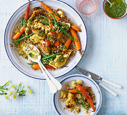 Roasted new carrots, cauliflower, grains & carrot-top dressing