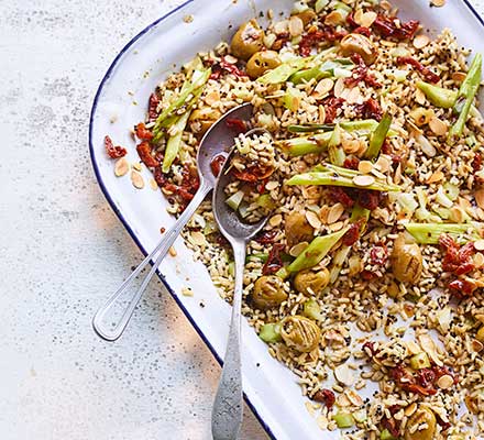 Charred spring onion & olive rice salad