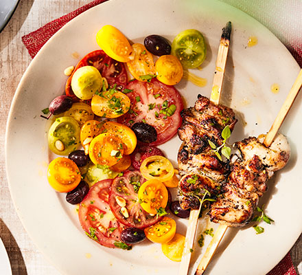 Preserved lemon chicken skewers with summer tomato salad