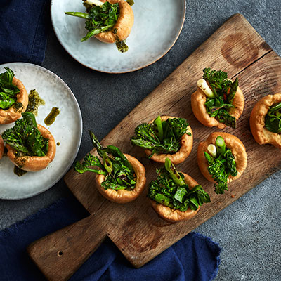 Yorkshire puddings filled with charred greens & mint sauce