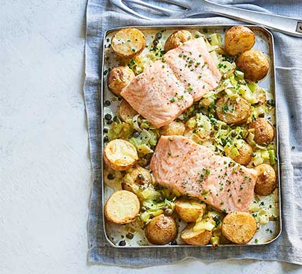 Creamy salmon, leek & potato traybake