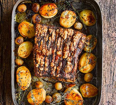 Roast pork belly, fondant potatoes & pickled onions