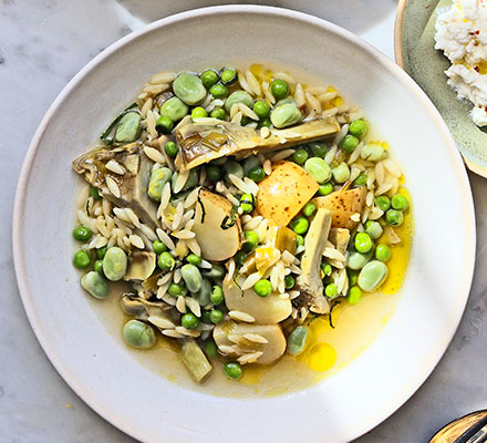 Spring vegetable orzo with broad beans, peas, artichokes & ricotta