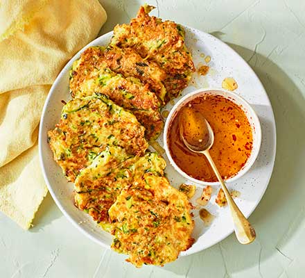 Sesame, halloumi & courgette fritters with chilli honey drizzle