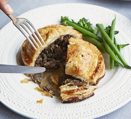 Braised ox cheek Wellingtons with peppercorn gravy