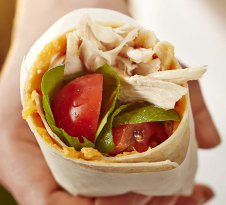 Chicken wrap with sticky sweet potato, salad leaves & tomatoes