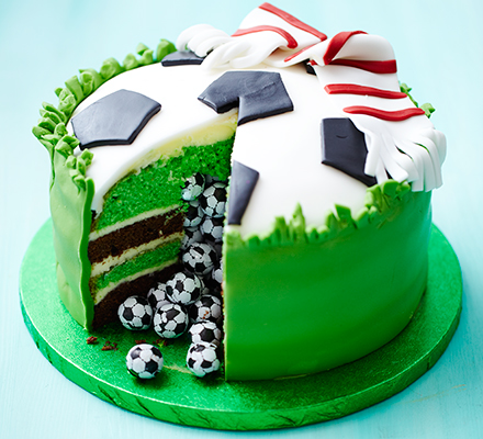 Surprise piñata football cake