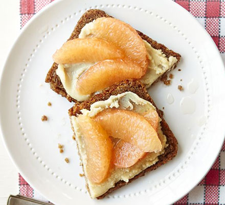 Rye bread with almond butter & pink grapefruit segments