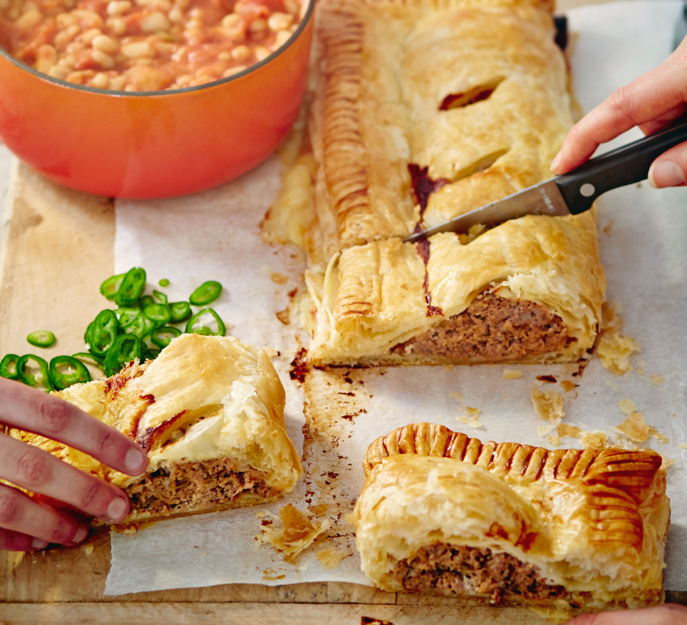 Jumbo sausage roll with salsa beans