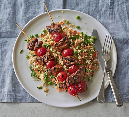 Spiced lamb kebabs with pea & herb couscous