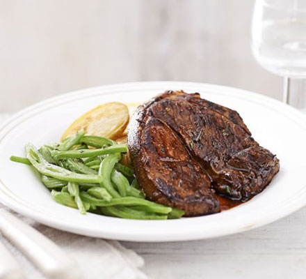 Lamb steaks with crispy potatoes & minted beans