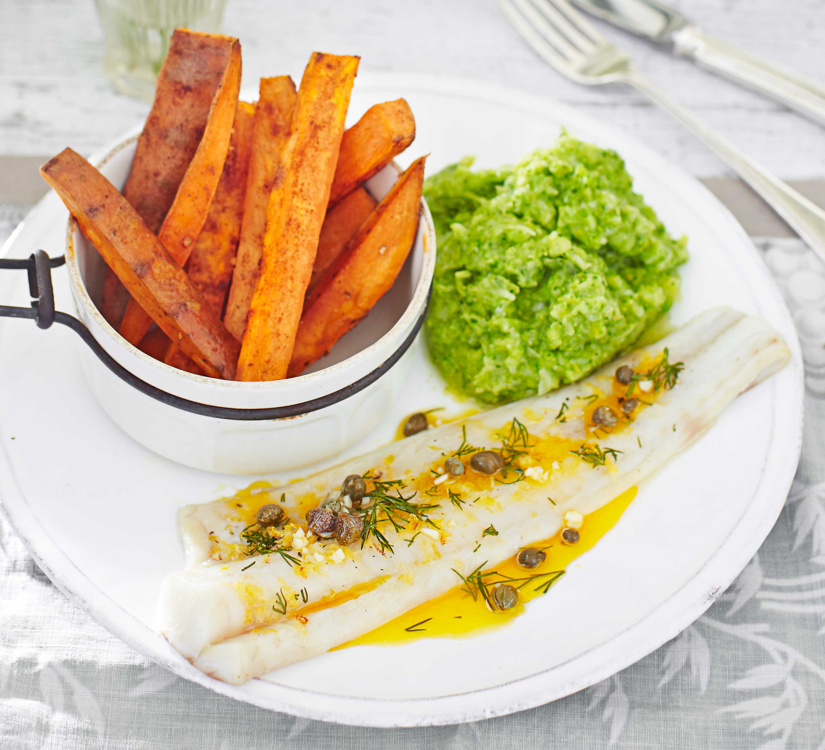 Lemon pollock with sweet potato chips & broccoli mash