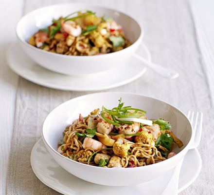 Spiced Singapore noodles with cauliflower, chicken & prawns