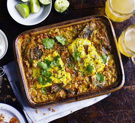 One-pan lentil dhal with curried fish & crispy skin
