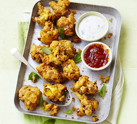 Spicy squid pakoras with coconut yogurt dip