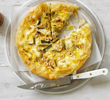 Goat’s cheese, spring onion & hazelnut tart