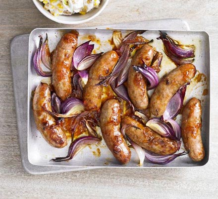 Sticky sausages with potato sweetcorn salad