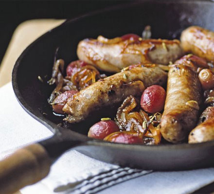 Sticky pan-roasted sausages with grapes